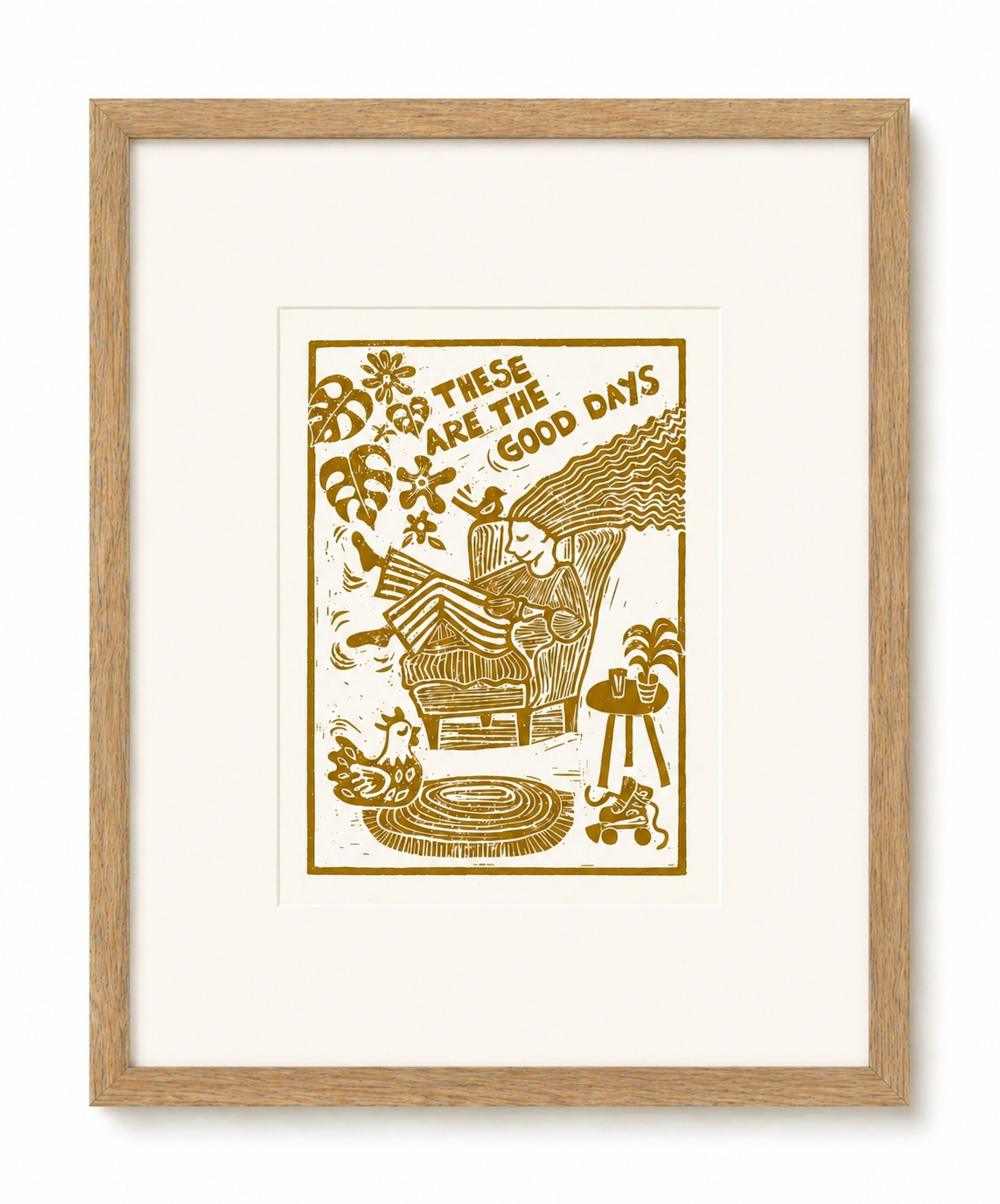 Framed artwork with a gold print on a white background