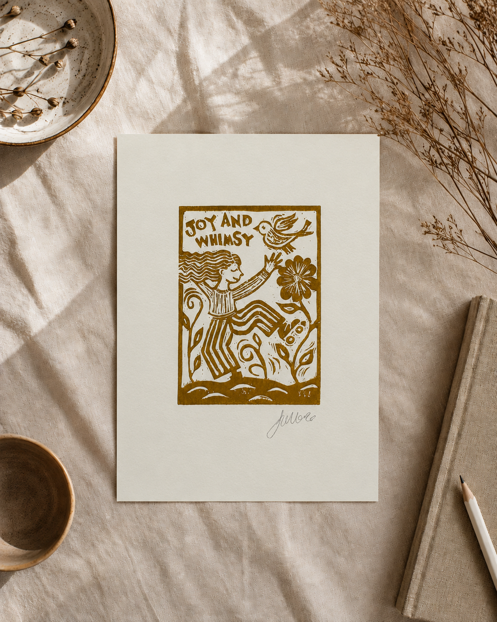 Decorative print with a stylized illustration of a woman and text on a beige surface with natural elements.
