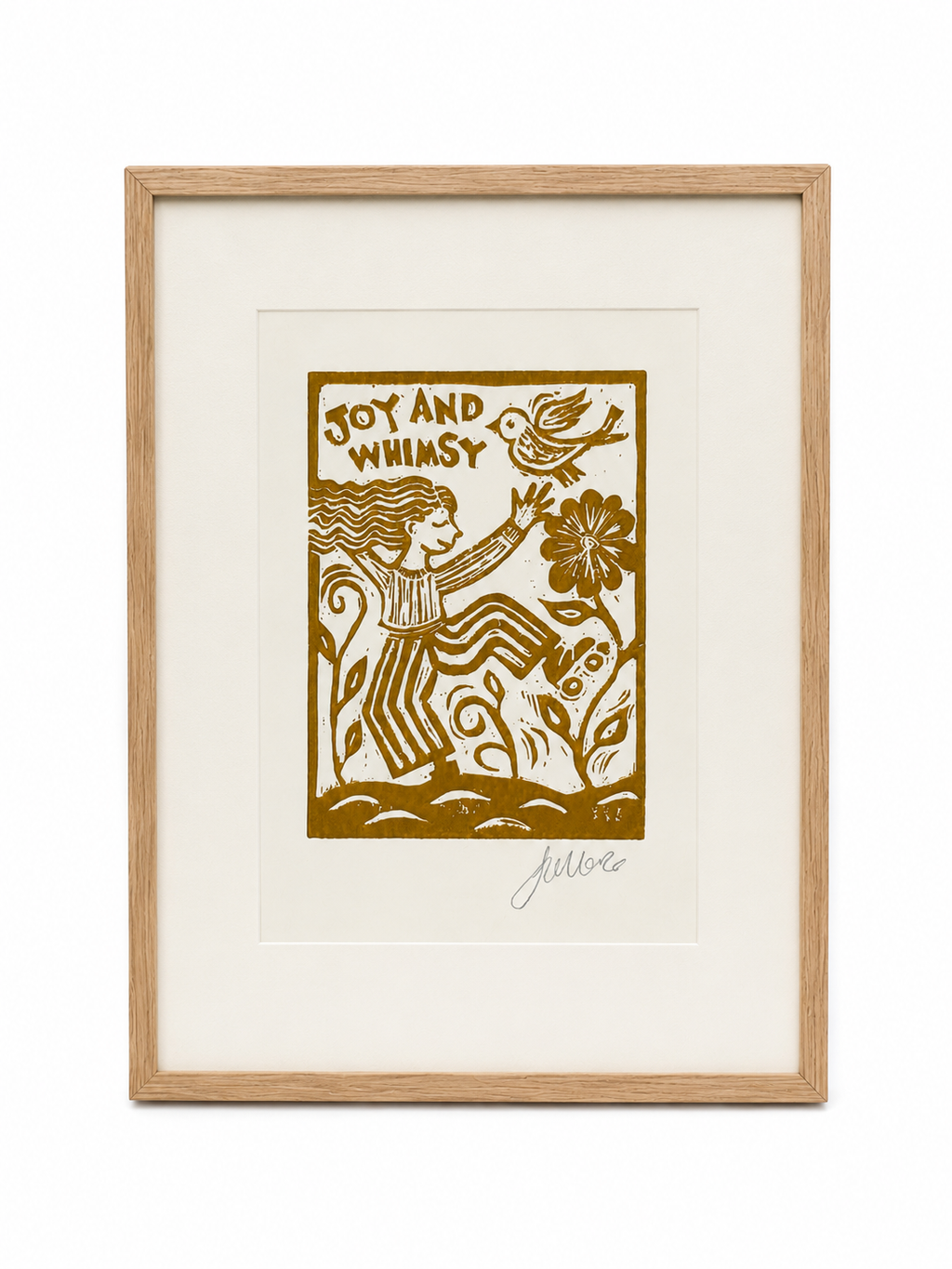 Framed artwork with a stylized illustration of a woman, flowers, and text 'Joy and Whimsy' on a white background.